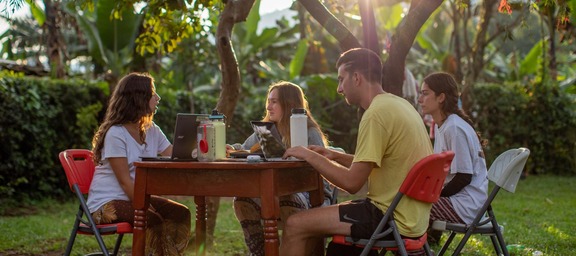 study abroad students sitting at a table